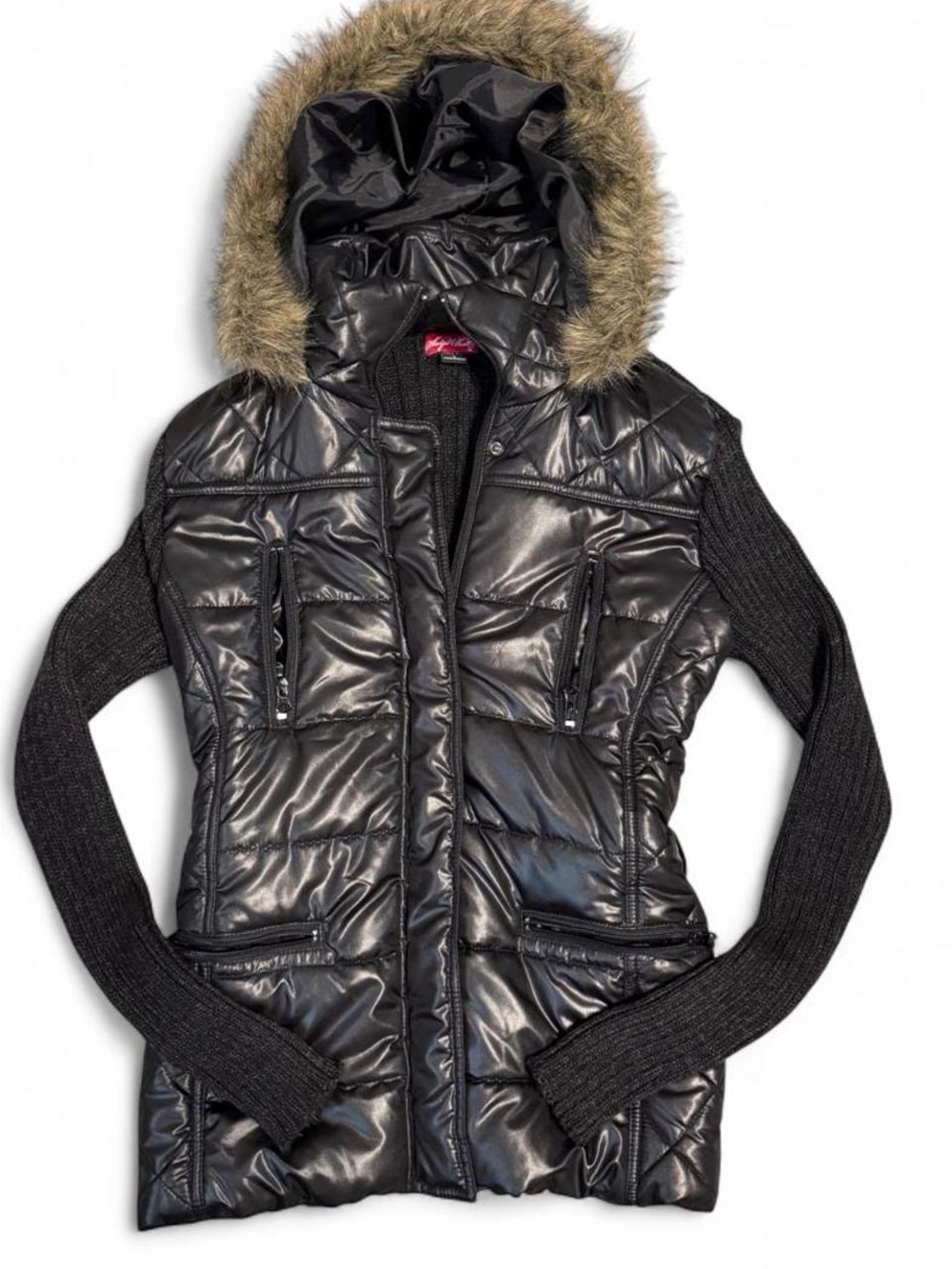 Say What? Black Glossy Puffer Jacket with Faux Fur Hood and Knit Sleeves